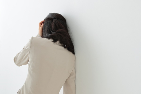 ふらつく女性