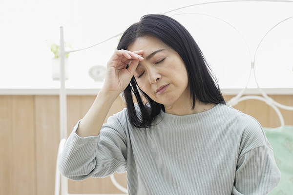 具合の悪そうな女性